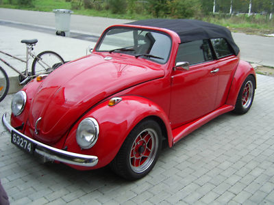 vwkafercabrioumbauporschemotorjpg Das Cabrio hat die Farbe rot